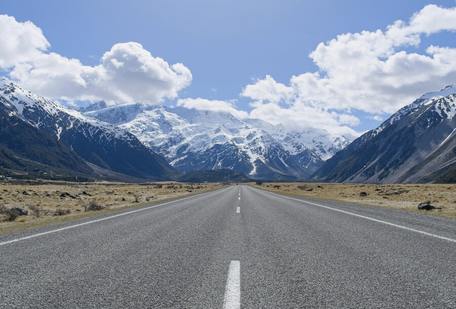 The cheapest way to travel New Zealand is often by campervan relocation, where travellers drive vehicles between locations for $1/day via platforms like Imoova.